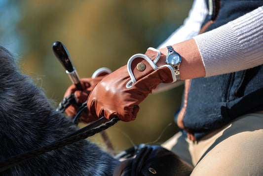 Foxbury Heritage Tan Gloves with White Piping on Horse