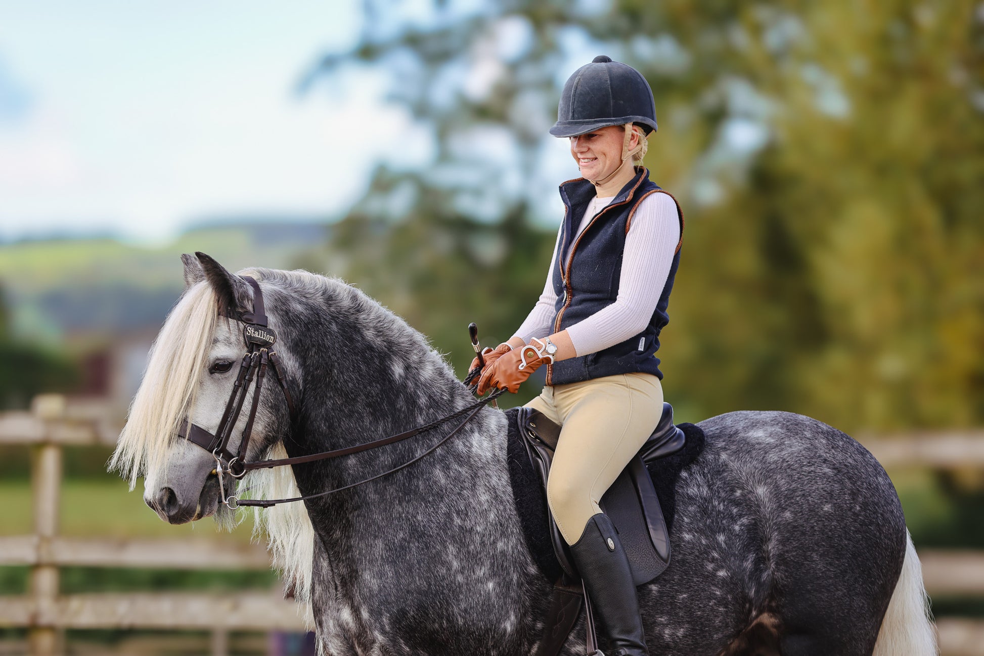 Model Riding with Foxbury Heritage Saddle Pad in Black Tweed Merino Wool 2